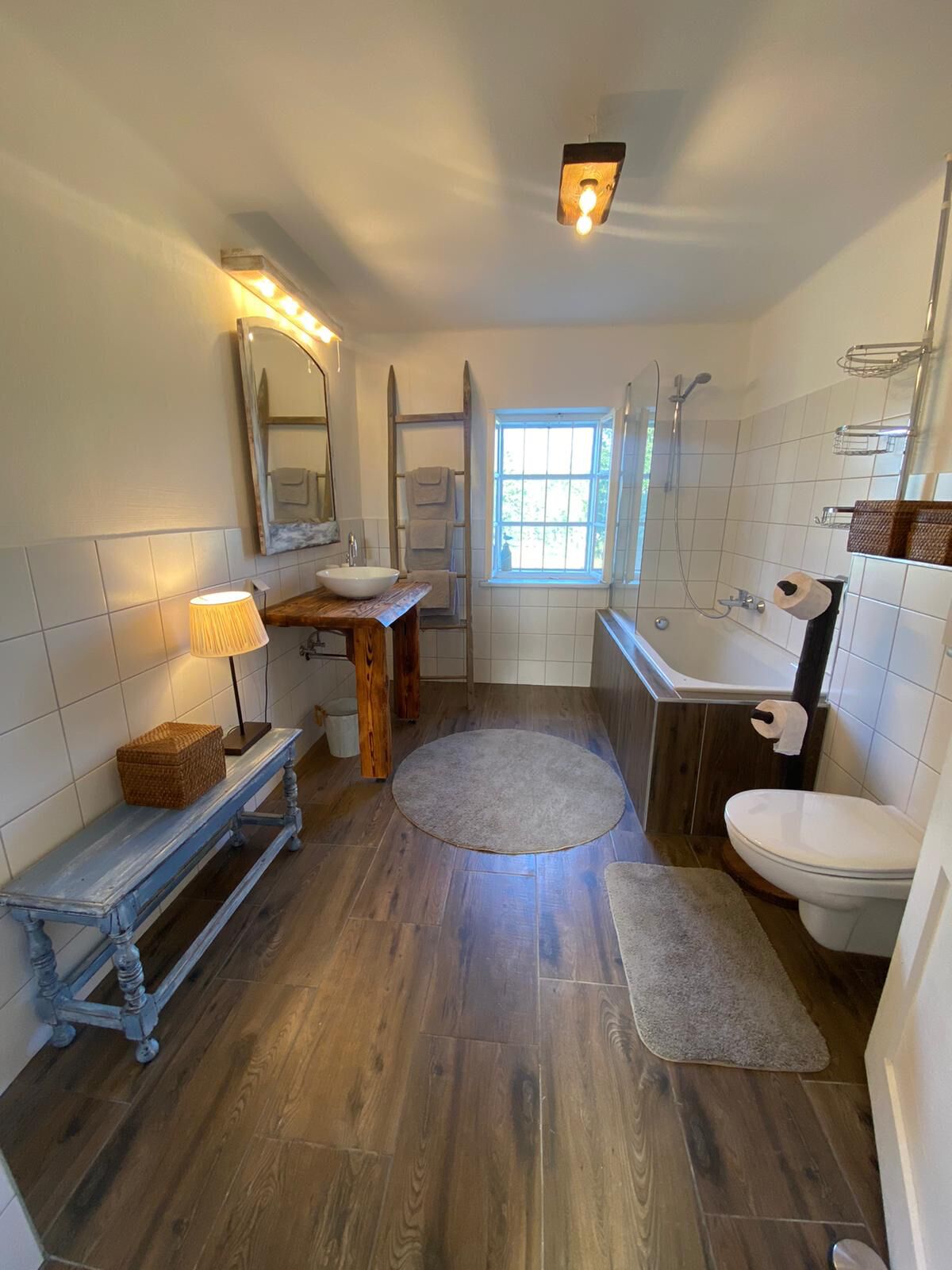 Bathtub, hair dryer, towels, soap