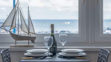 Apartment (1 Bedroom) | Living area | 32-inch TV with cable channels