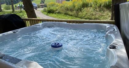 #1 Cabin~Walk to WISP! Lake access & dock! HOT Tub~Game room~Fire Pit & DOGS OK!