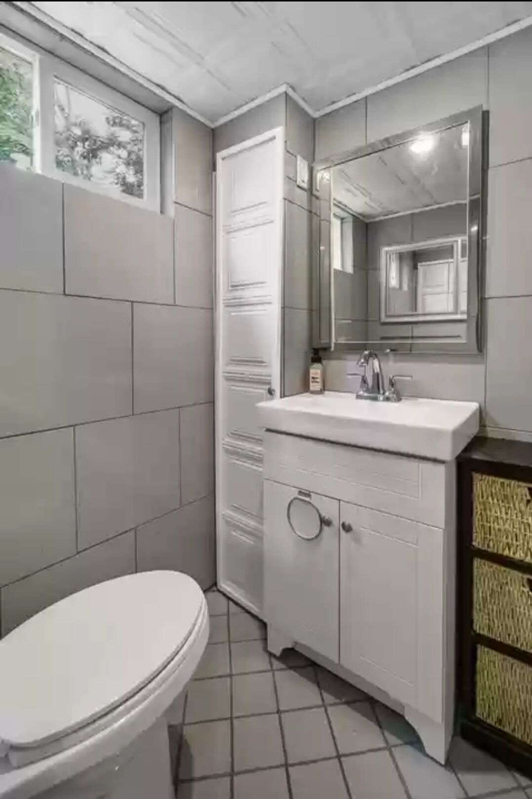 Bathtub, towels, soap, toilet paper
