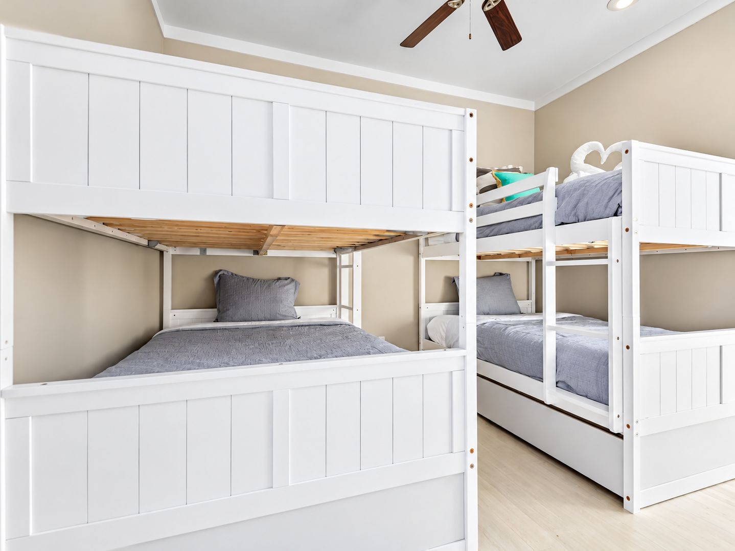 Spacious bunk room with multiple built-in beds, ideal for kids, cousins, or group getaways to Crystal Beach.