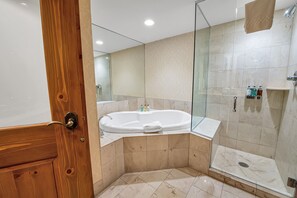 Bathtub, hair dryer, towels, soap