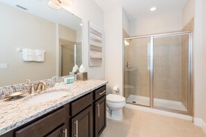 Combined shower/tub, hair dryer, towels, soap