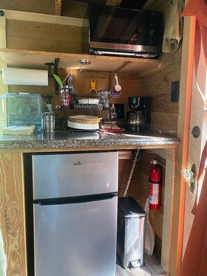 Microwave, coffee/tea maker, toaster, cookware/dishes/utensils