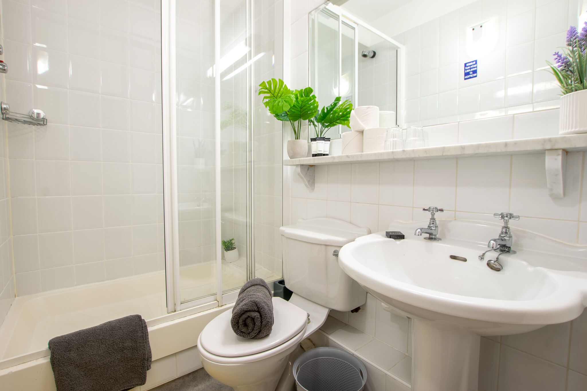 Combined shower/bathtub, hair dryer, towels, soap