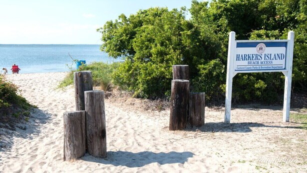 A beach access sign for Harkers Island, Carteret County Parks & Recreation Department. - Fin's Fish Camp at Harker's Island (Harkers Island)