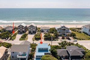 A coastal residential area with houses, a beach, and a clear view of the ocean. - Ocean View House, Steps to Beach, Pet Friendly, Linens & Beach Gear Provided (Surf City)