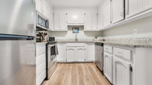 Coffee/tea maker, fridge, microwave, oven - Beachfront Daze, Oceanfront with Pool (Carolina Beach)