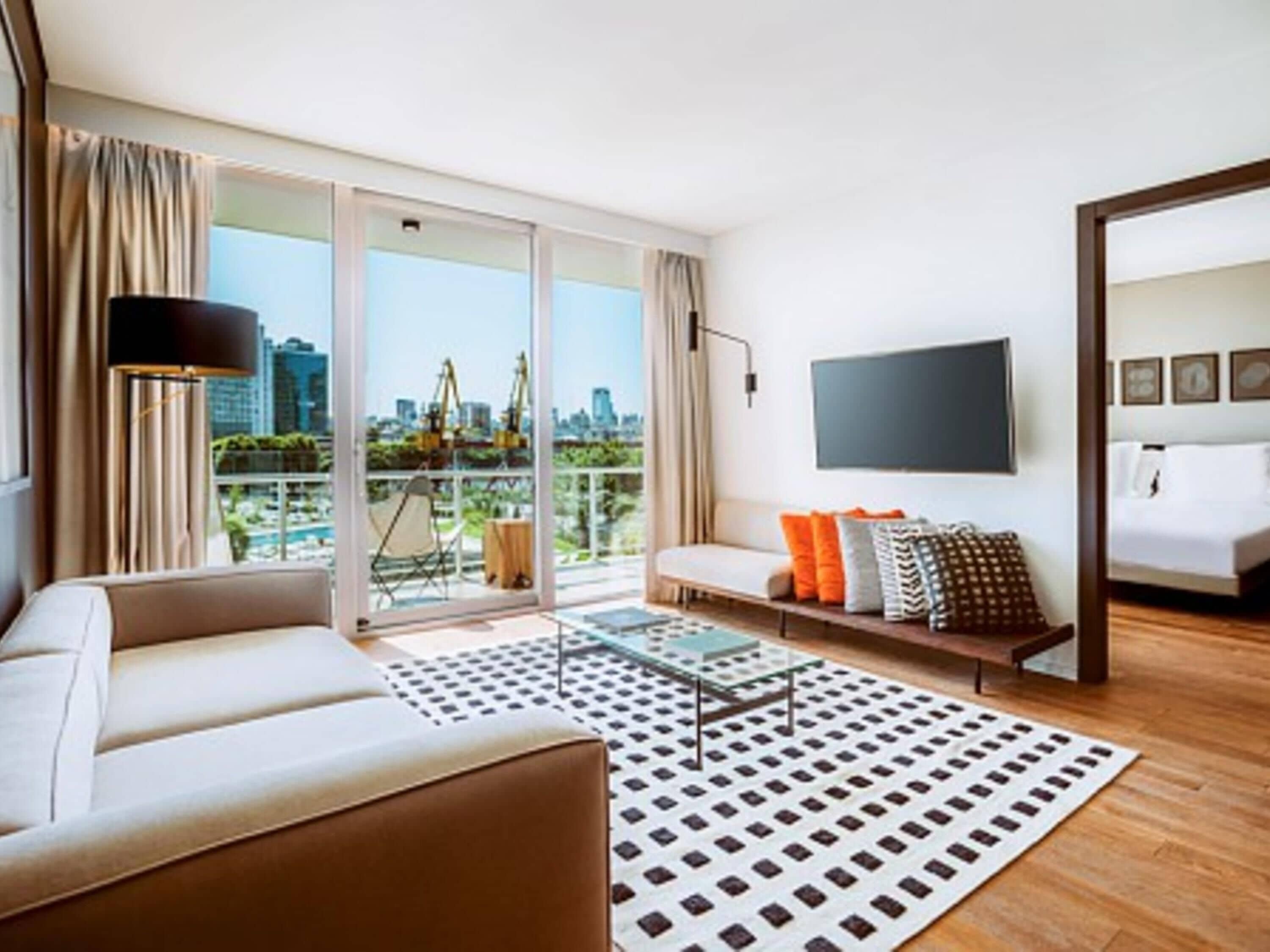 Deluxe Suite, 1 King Bed, Harbor View | Premium bedding, minibar, in-room safe, individually decorated