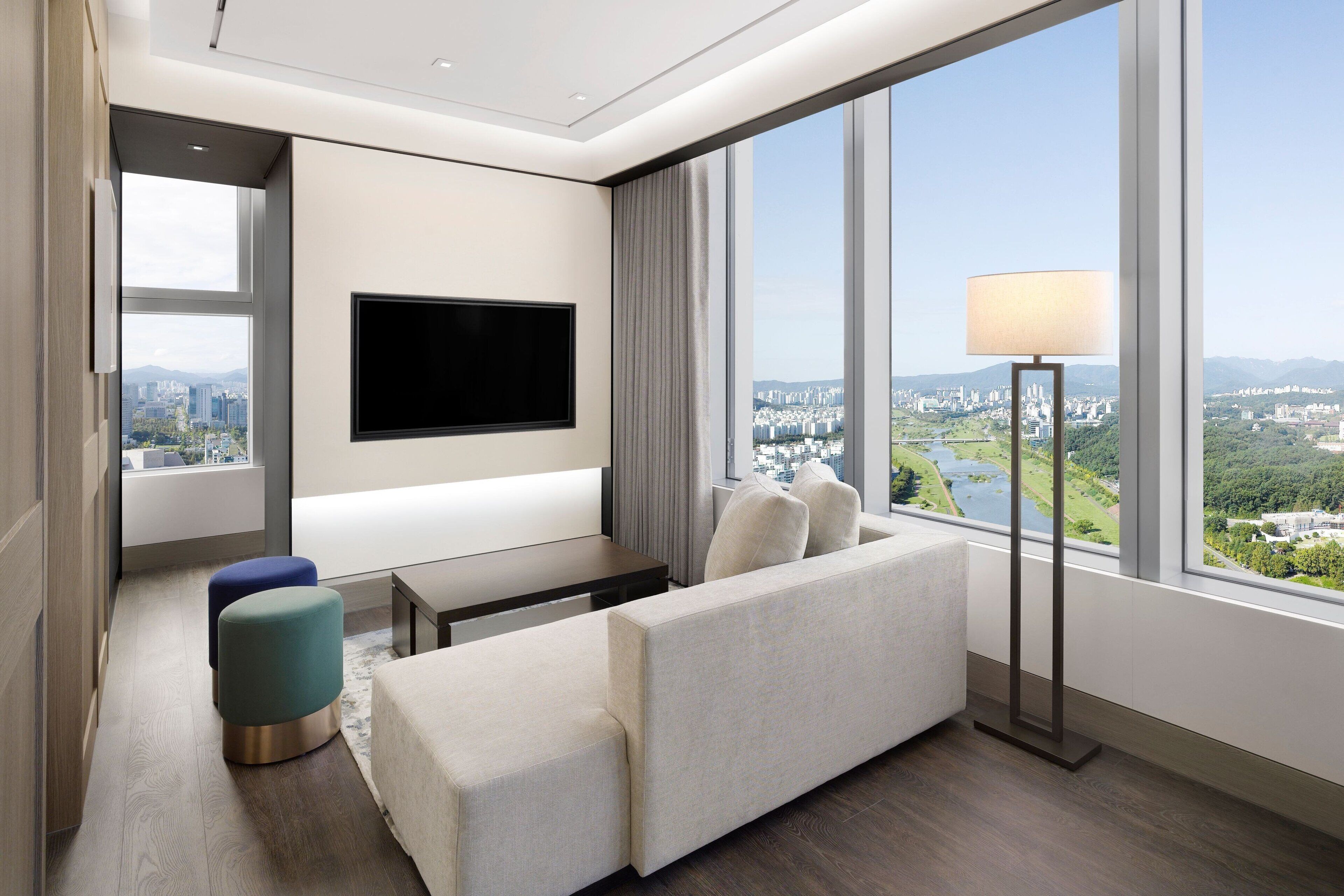 suite, 1 king bed, corner (magnolia) | free minibar, in-room safe, blackout curtains, iron/ironing board