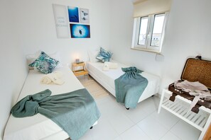 2 عدّة غرف نوم ومكواة/لوح كي وواي فاي مجانًا وملاءات أسرّة