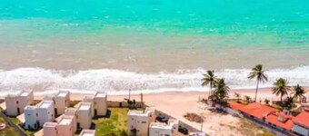 Triplex in a closed condominium - by the sea