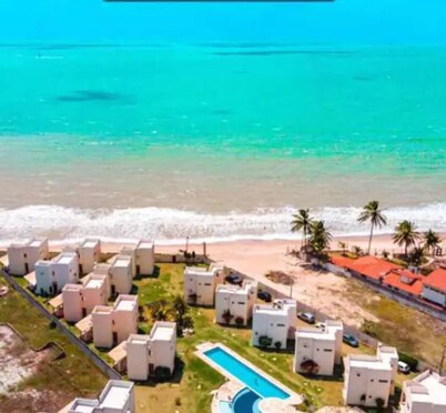 Triplex in a closed condominium - by the sea