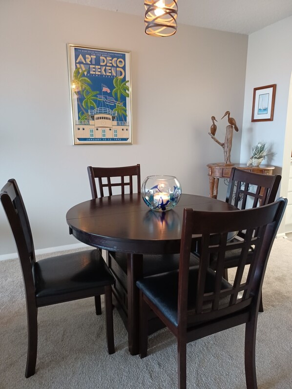 Enjoy meals in this dining area with a round table and six comfortable chairs.
