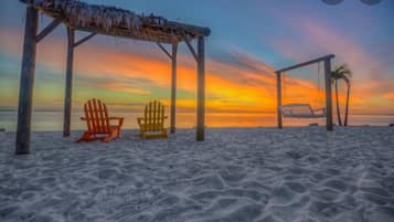 On the beach, sun loungers, beach towels