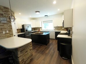 Fridge, microwave, oven, stovetop - The Red Brick Country Home in Eden Utah | 6 Bed, 6 Bath (Eden)