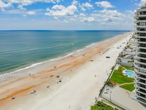 On the beach, sun loungers, beach towels