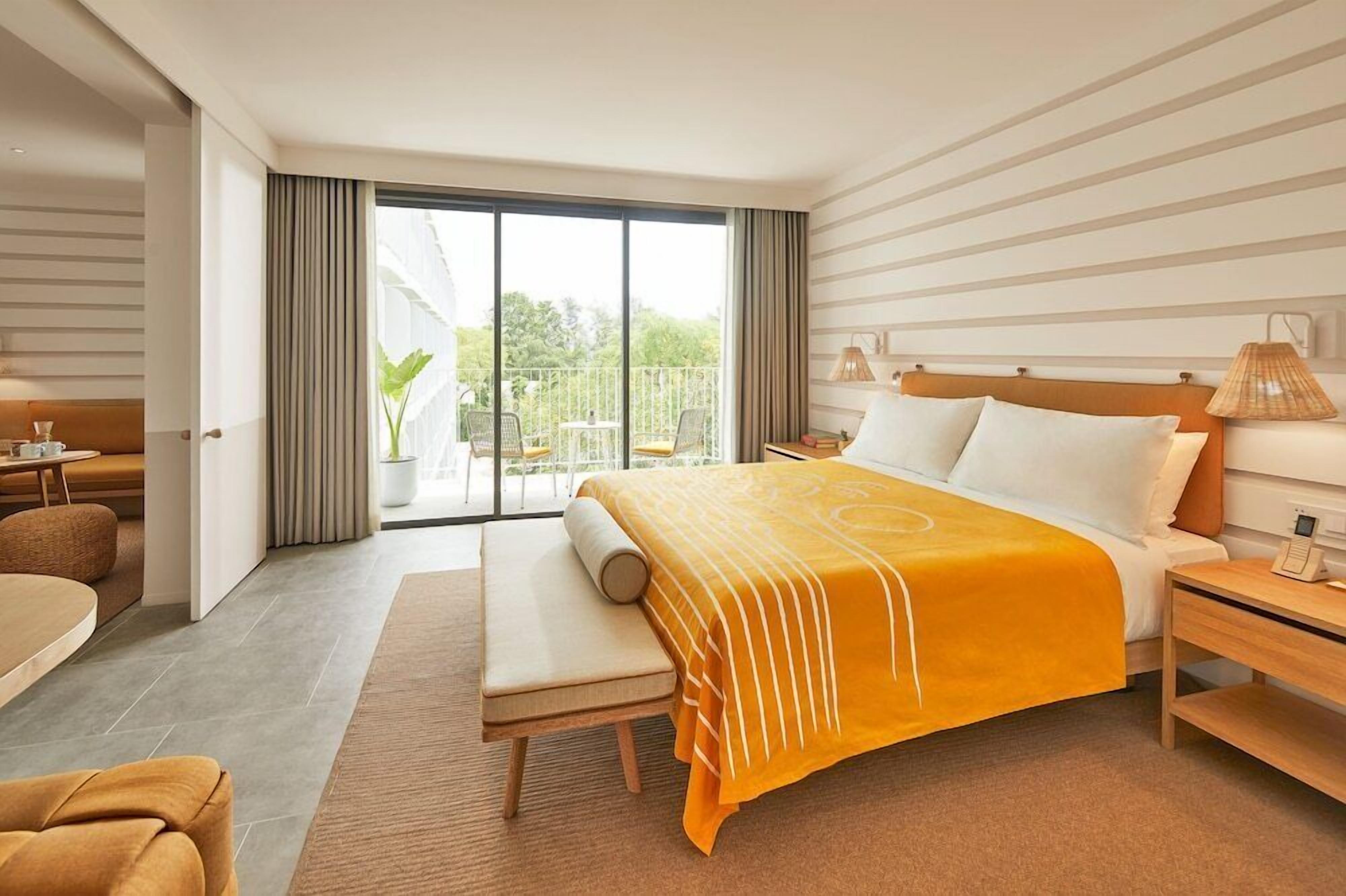 Hypo-allergenic bedding, down duvets, pillow-top beds, minibar