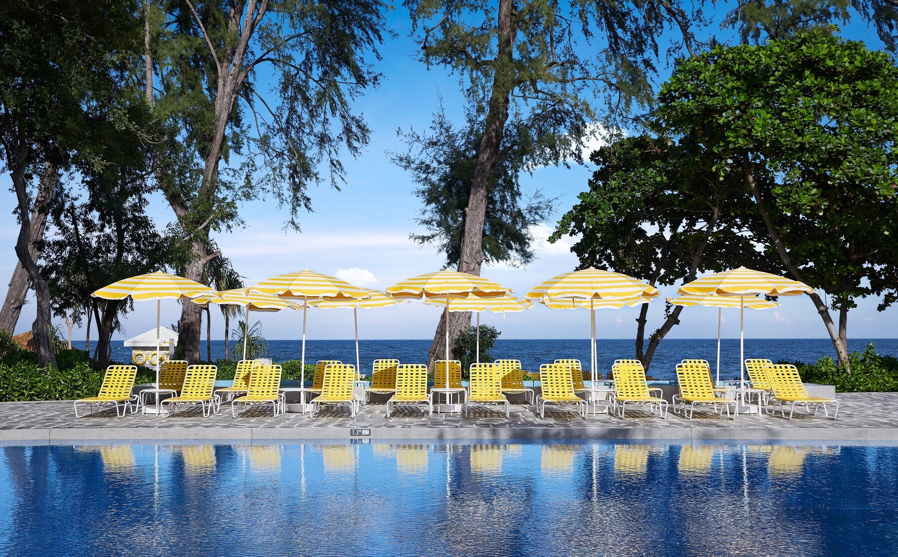 Outdoor pool, open 7:00 AM to 8:00 PM, free pool cabanas, pool umbrellas