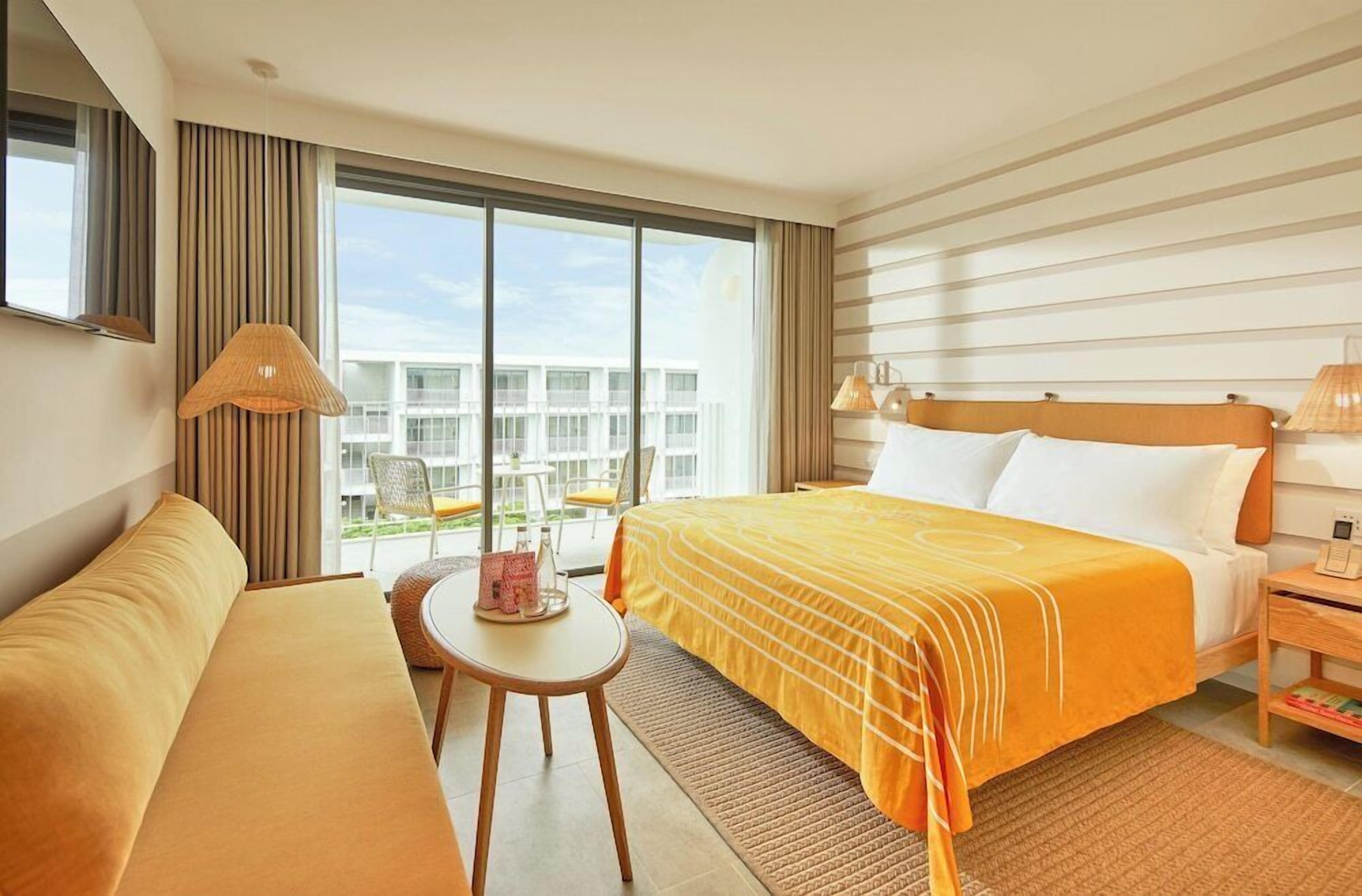 Hypo-allergenic bedding, down duvets, pillow-top beds, minibar