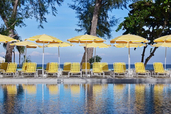 Outdoor pool, open 7:00 AM to 8:00 PM, free pool cabanas, pool umbrellas