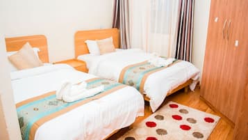 1 bedroom, desk, iron/ironing board, travel cot