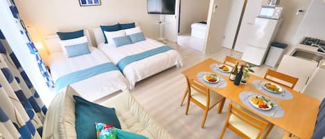 Family Apartment, Non Smoking | Desk, blackout drapes, iron/ironing board, free WiFi