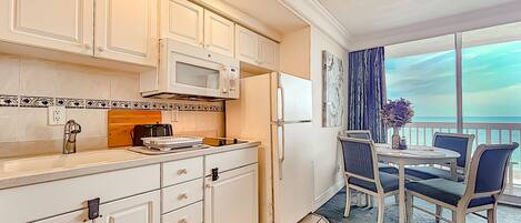 Fridge, microwave, coffee/tea maker, toaster