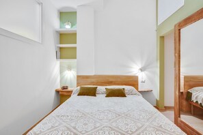 1 habitación, tabla de planchar con plancha, wifi y ropa de cama 