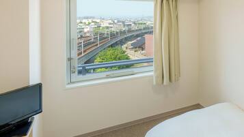 Down comforters, laptop workspace, blackout drapes, iron/ironing board