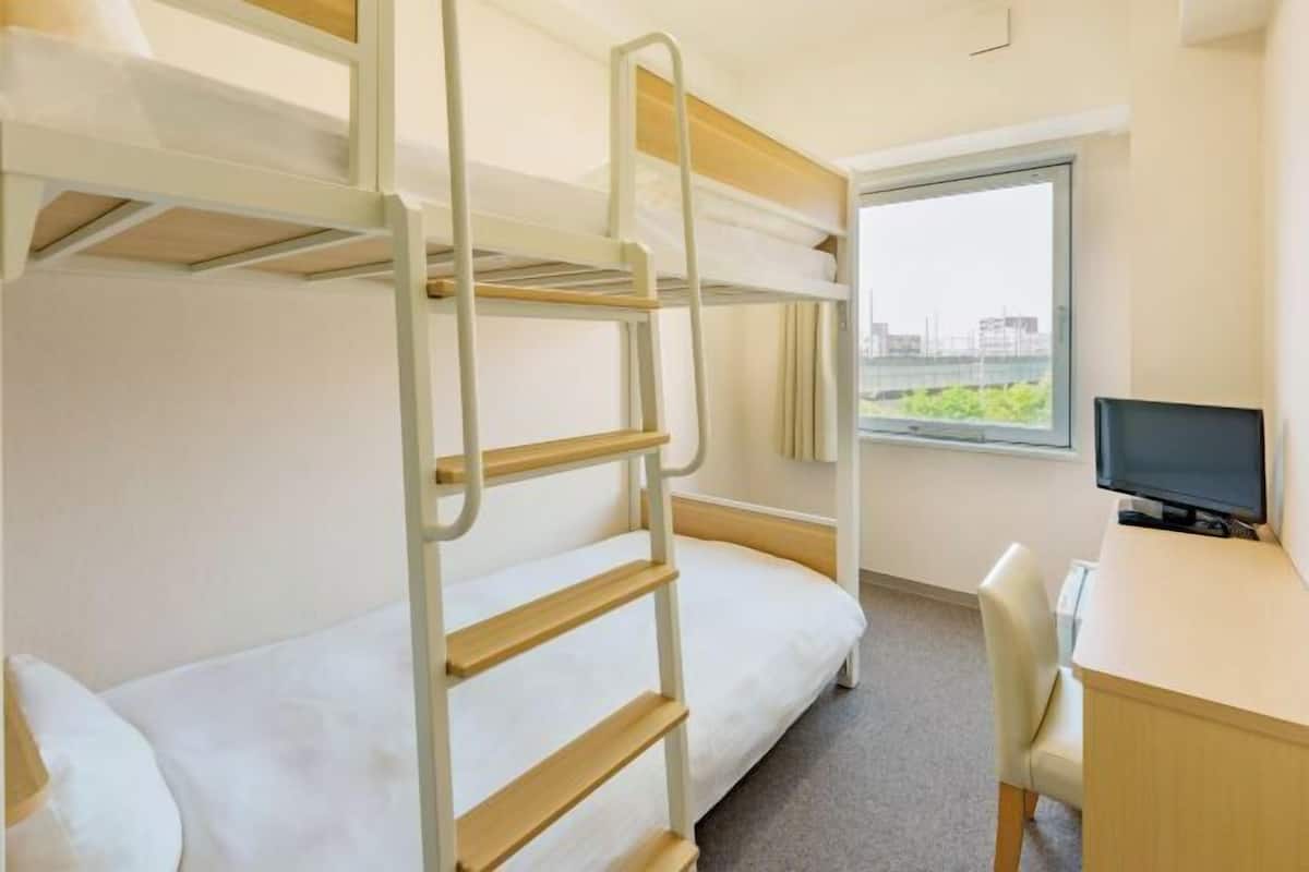 Down duvets, laptop workspace, blackout curtains, iron/ironing board