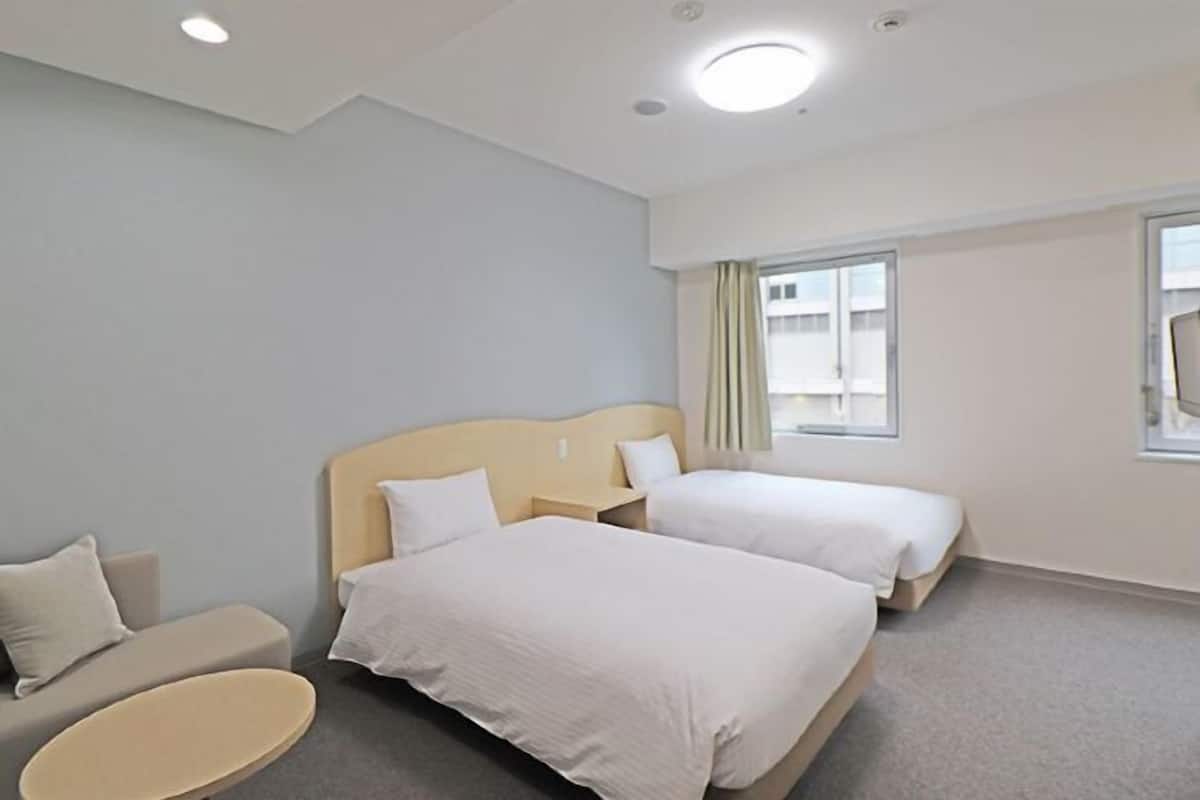 Down duvets, laptop workspace, blackout curtains, iron/ironing board