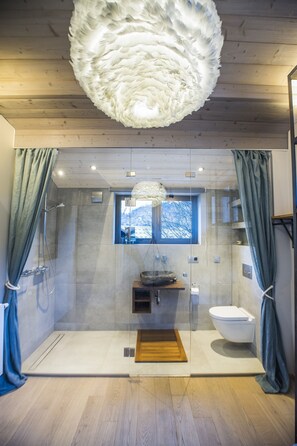 Bathtub, hair dryer, towels, soap