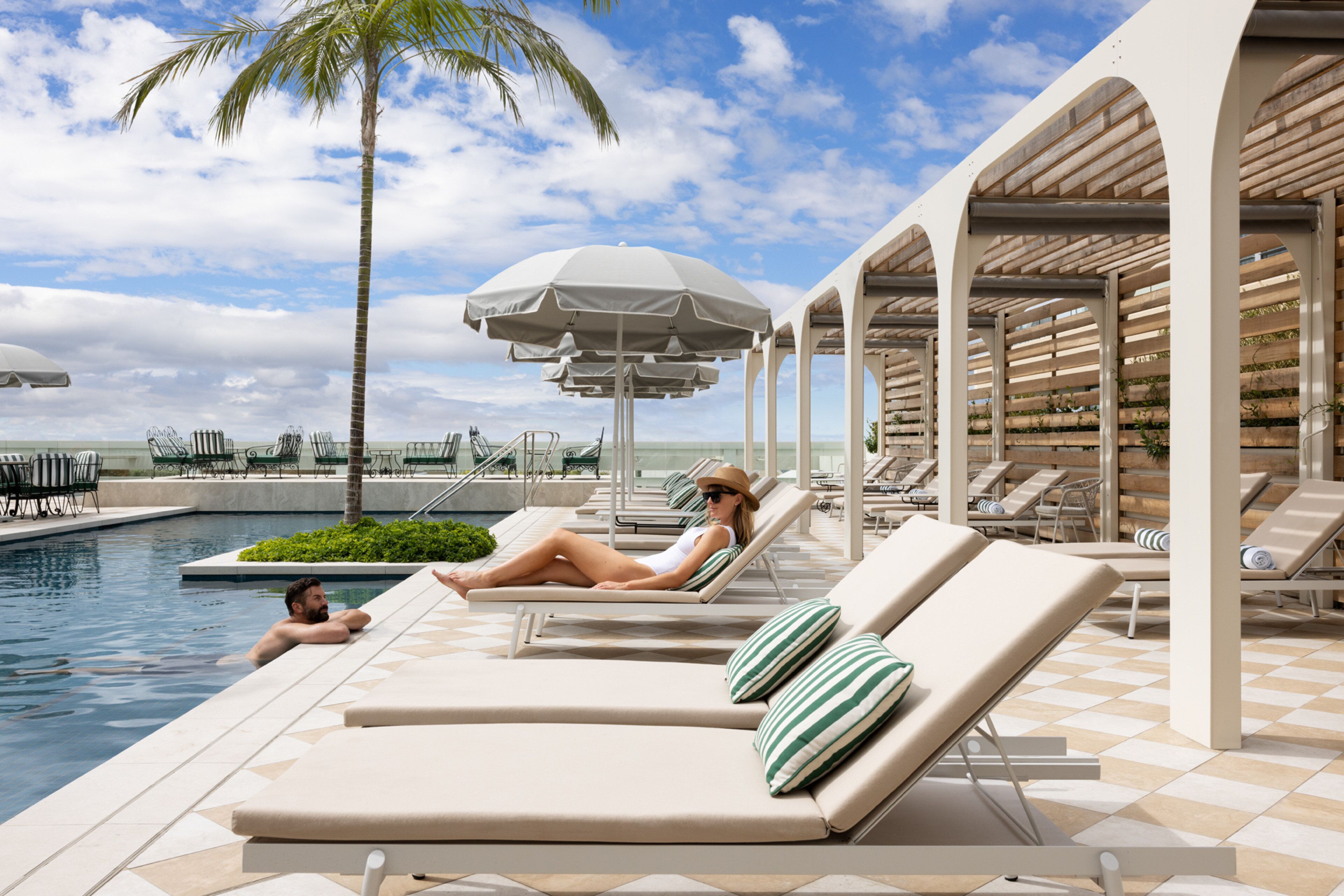 Outdoor pool, open 7:00 AM to 7:00 PM, free pool cabanas, pool umbrellas