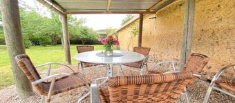 Maison chaleureuse avec un grand jardin