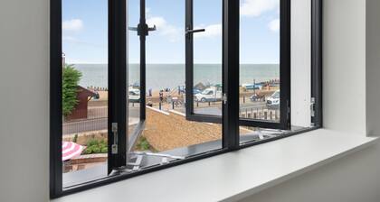 Lovely new home with sea views next to the beach!