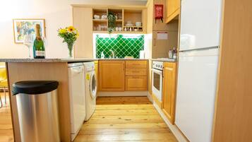 Fridge, dishwasher, cookware/dishes/utensils
