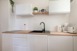 Fridge, microwave, electric kettle, toaster