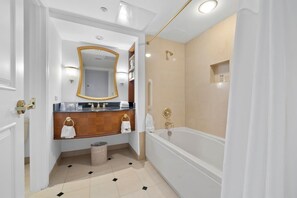 Bathtub, hair dryer, towels