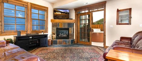 Flat-screen TV, fireplace