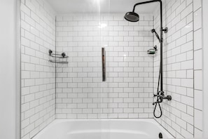 Combined shower/tub, towels, soap, toilet paper