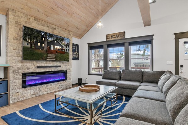 Smart TV, fireplace, books