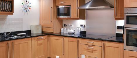 Dishwasher, highchair, cookware/dishes/utensils