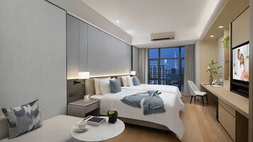 Deluxe Room, Multiple Beds | In-room safe, desk, blackout drapes, iron/ironing board