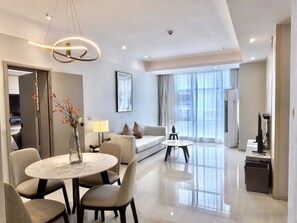 Deluxe Apartment, 3 Bedrooms | Living room | 55-inch LCD TV with cable channels, TV - Somerset Haizhu Centre Guangzhou (Guangzhou)