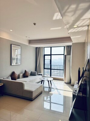 Deluxe Room, 2 Bedrooms | Living room | 55-inch LCD TV with cable channels, TV - Somerset Haizhu Centre Guangzhou (Guangzhou)