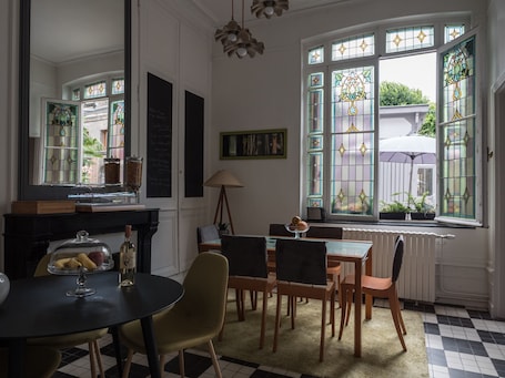 Dining. Notre Dame" guest room with garden view. Breakfast included