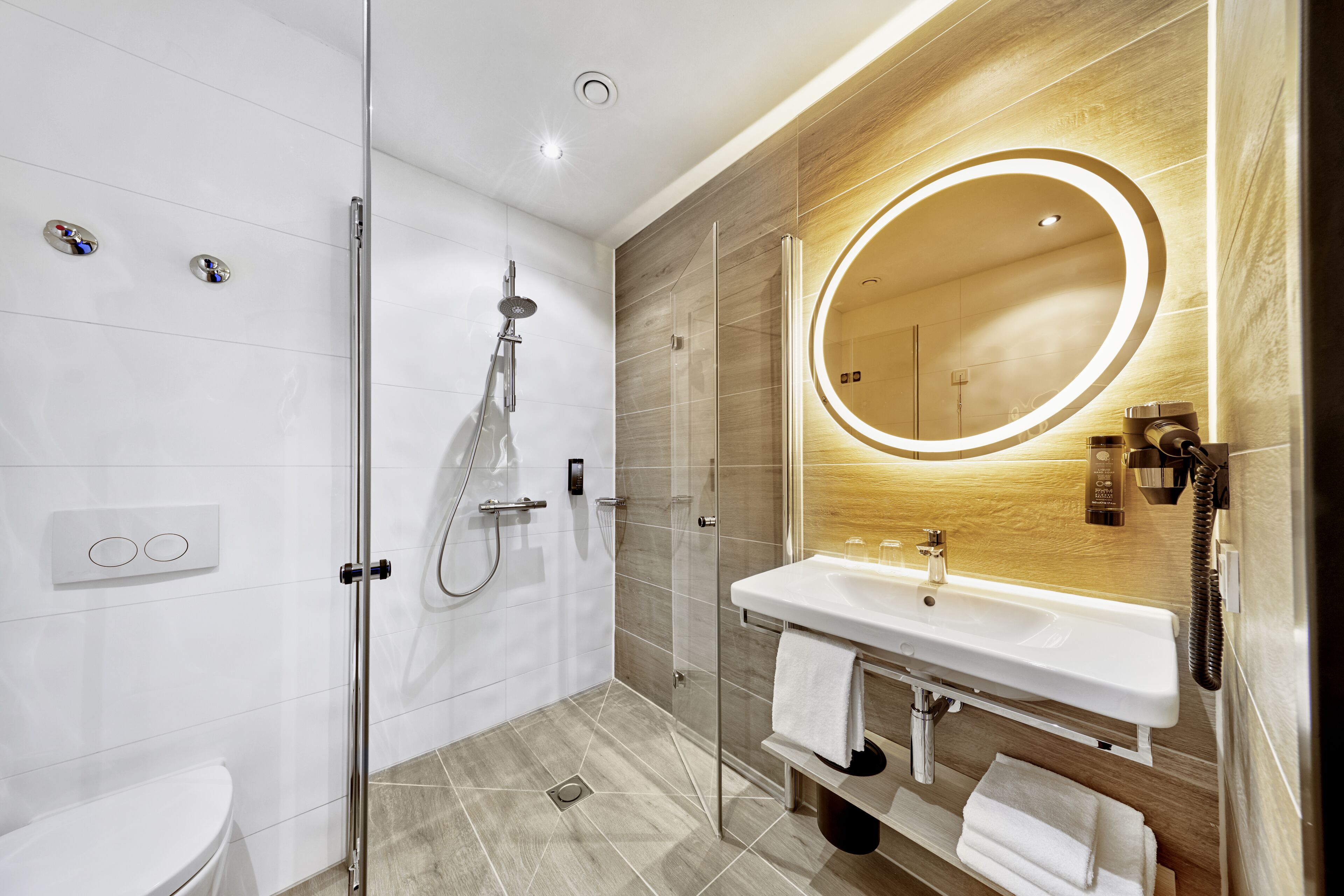 shower, free toiletries, hair dryer, towels