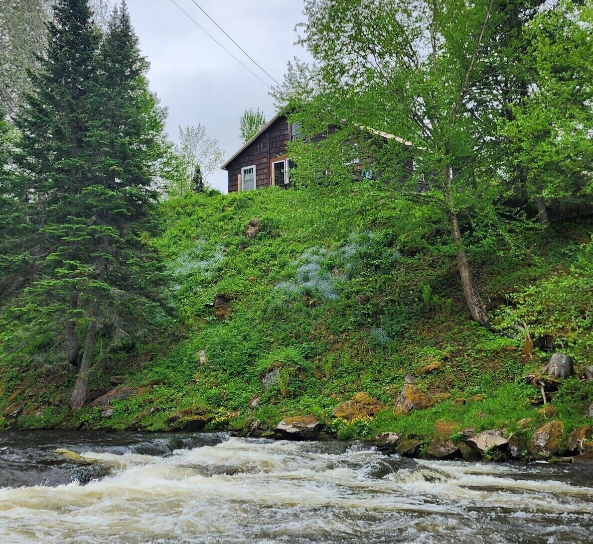 Cozy cabin overlooking Connecticut River waterfall on over 50 acres. 