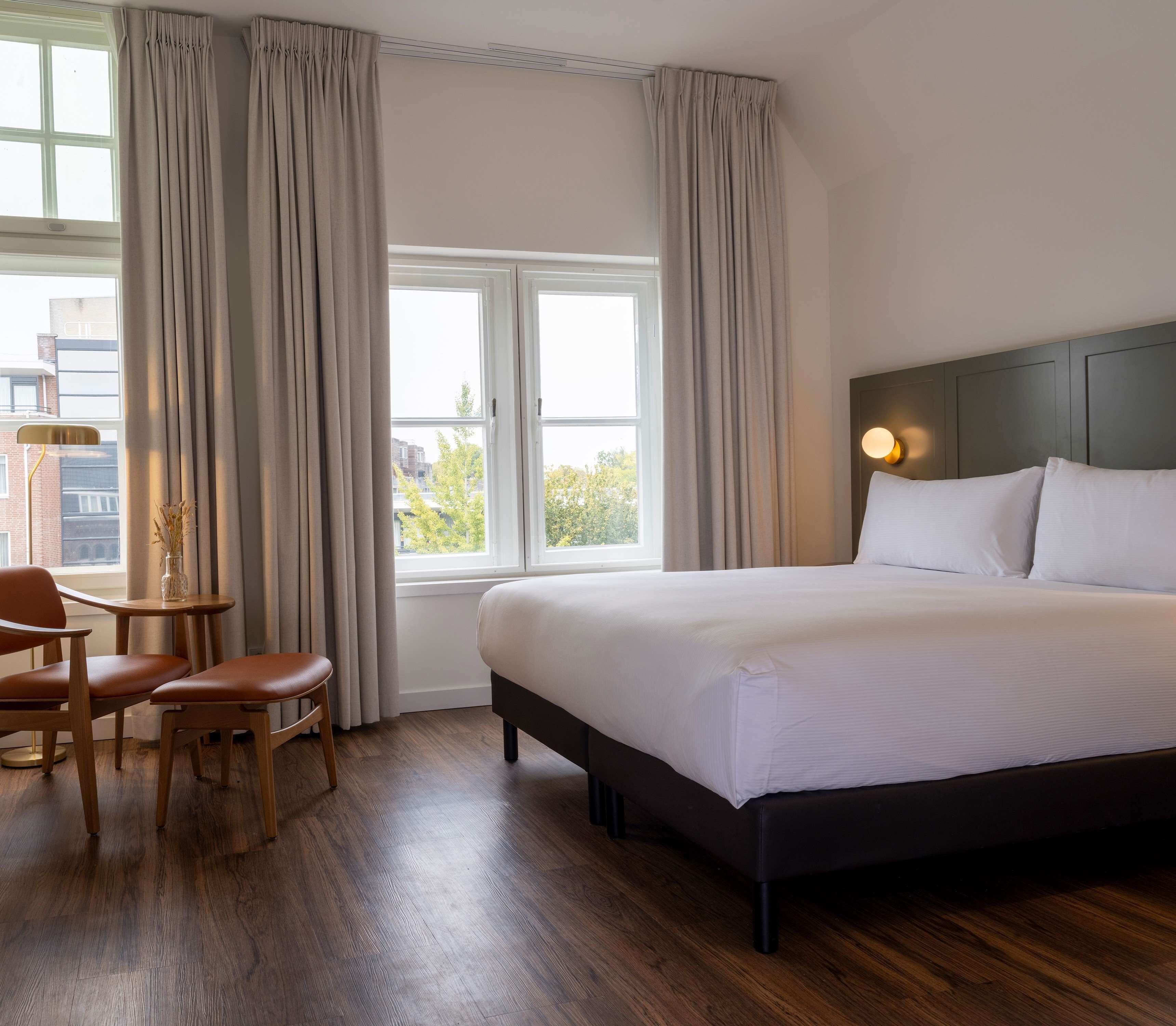 Habitación familiar, 1 cama de matrimonio grande, habitaciones comunicadas | Edredones de plumas, minibar, caja fuerte y escritorio